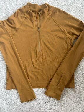 Lululemon Swiftly Tech Half-Zip Pullover in Mustard, size 8